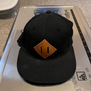 Undefeated Black Cap with Tan Patch